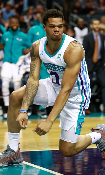 Walker scores 29, leads Hornets to 113-102 win over Hawks